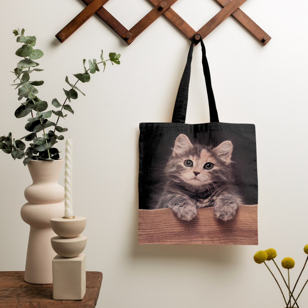 Cat Looking Over Wall Tote Bag