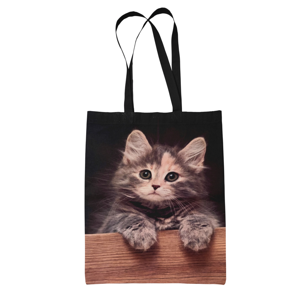 Cat Looking Over Wall Tote Bag