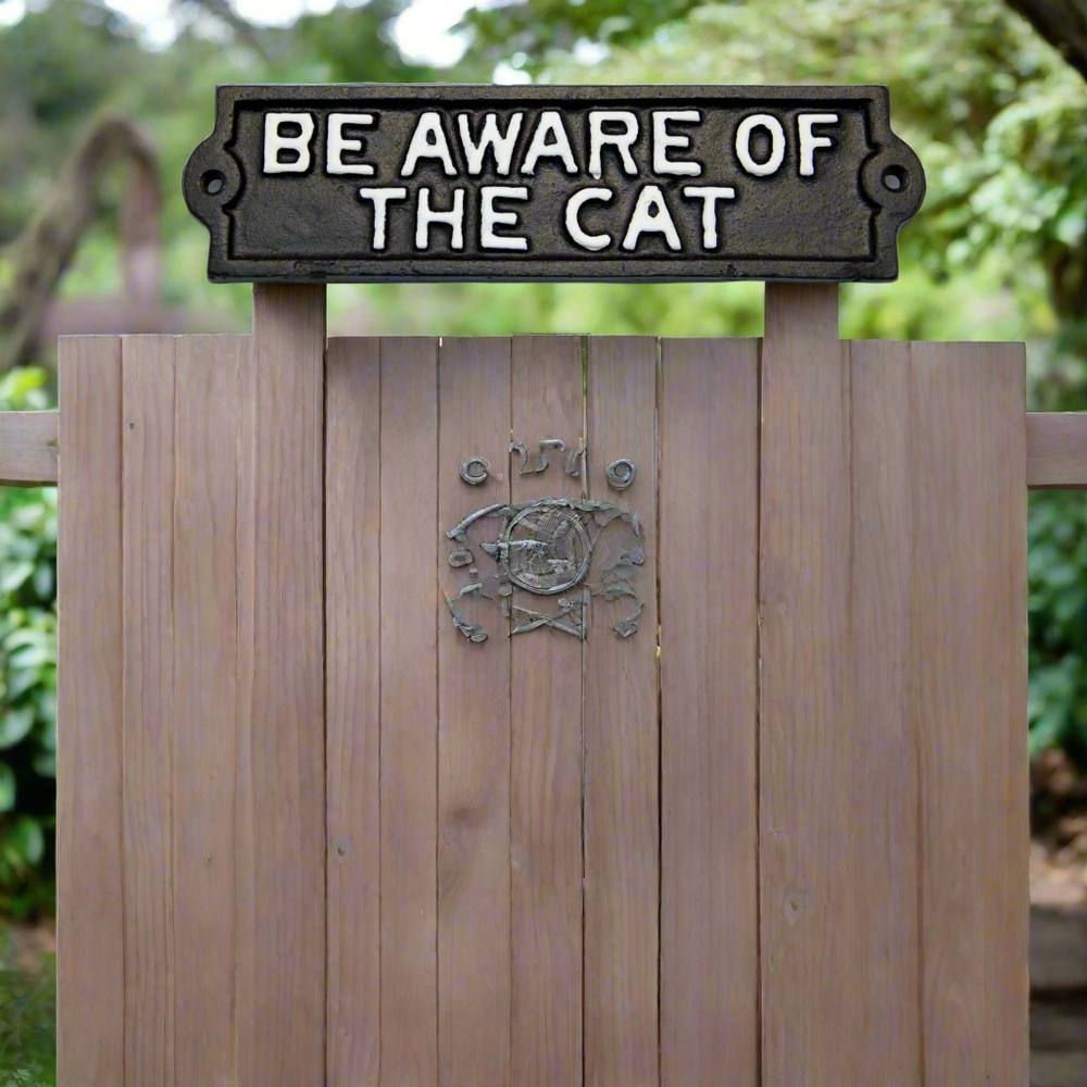 Be Aware of the Cat Cast Iron Plaque